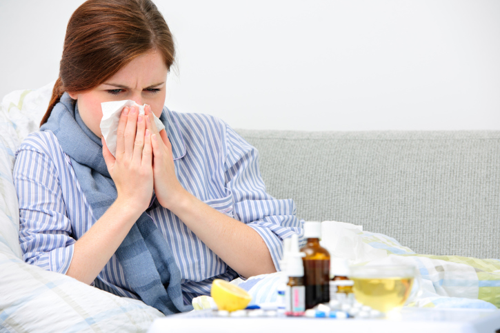 Sneezing woman